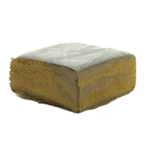 Pollen marroquí cbd Mandala 10 g de couleur brun doré et texture friable, variété Marroquí résine tamisée premium